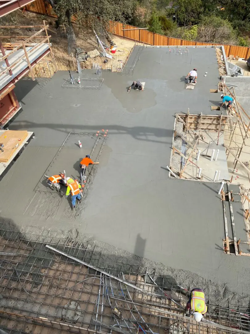 Top view of construction crew working on concrete